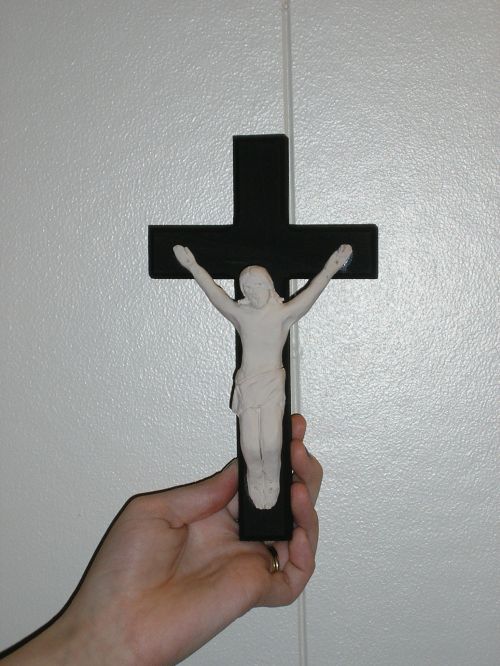 A simple crucifix with a stark, symbolic, black-and-white interplay.