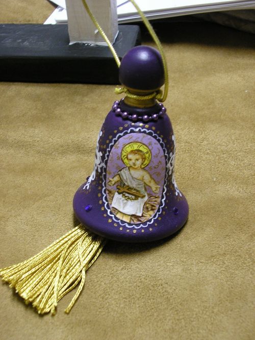 Bell ornament with a painting of the infant Christ, with cross and thorns.  $30